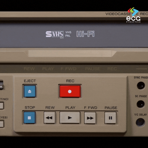 A Super VHS deck with a tape being inserted, showcasing the equipment used for VHS digitization and restoration at ECG Productions.