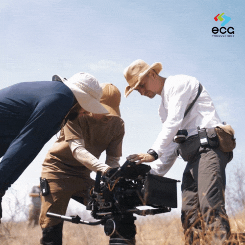 A Digital Imaging Technician (DIT) waits on set in the desert to receive a memory card for pulling and managing footage, showcasing the crucial role of DITs in digital workflow.