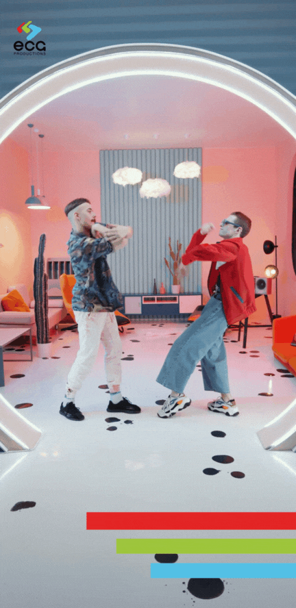 A music video scene with two artsy men dancing and engaging with the camera, highlighting ECG’s bold and creative art direction.